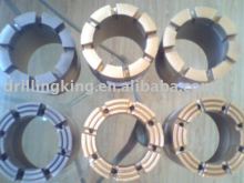 Impregnated diamond rock core bits