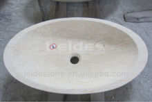 Sunny yellow marble wash basin