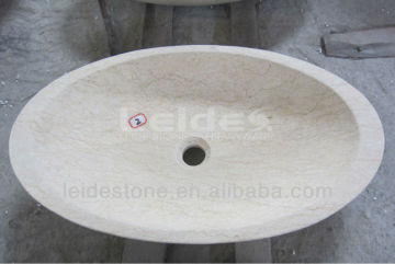 Sunny yellow marble wash basin