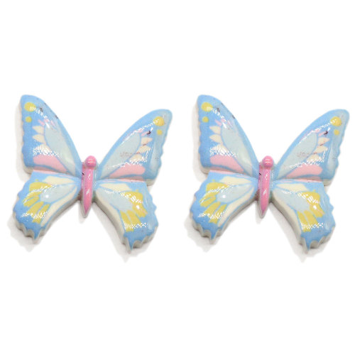 Venta caliente 100 unids / lote resina de mariposa cabujón de espalda plana Kawaii adorno de mariposa para Scrapbooking lazos para el cabello artesanía