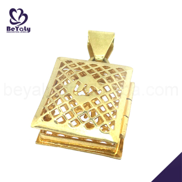 Gold plated hollow engraved stainless steel locket pendant