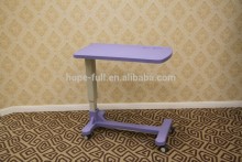 Hospital bed table with wheels