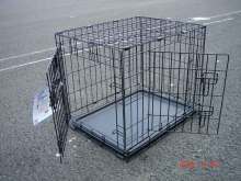 black metal wire dog crate