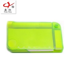 Small notepad with pen and mini plastic box