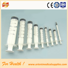 Plastic medical disposable syringe with needle