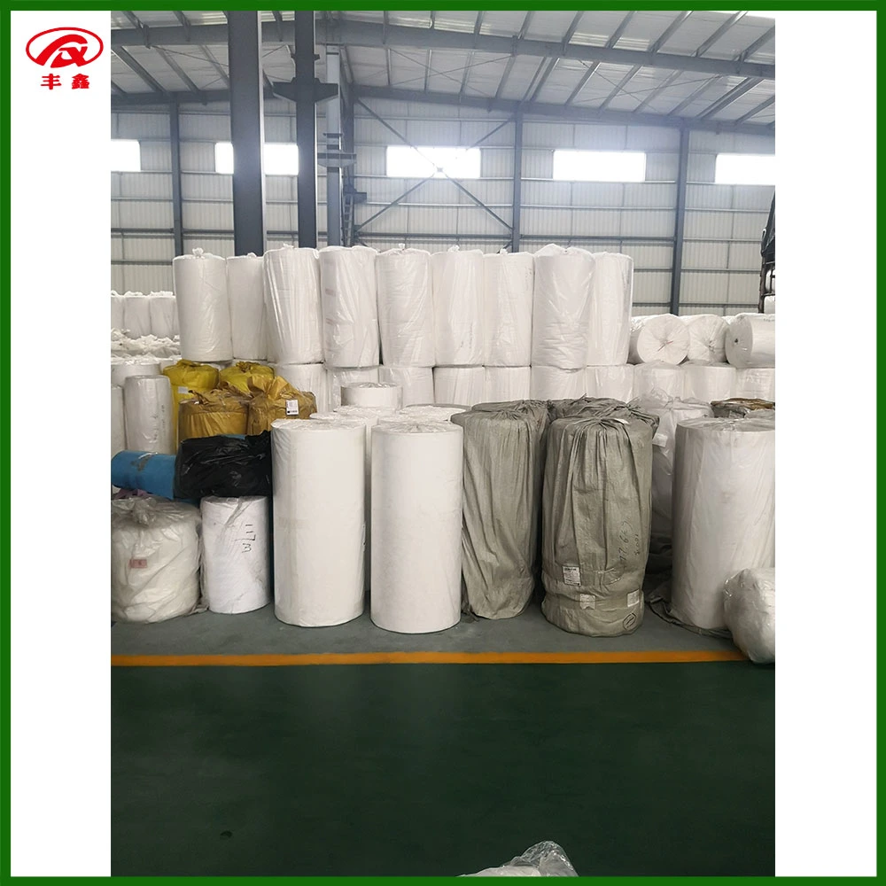 Borong 100% poliester panas fius nonwoven interlining fabric