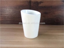 white porcelain cup / ceramic cup