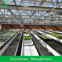 Greenhouse cooling pad and fan