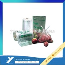 Fruit and vegetables packed clear plastic rolling bag