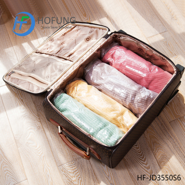 Hand press vacuum bags for travel