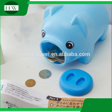 plastic pig coin bank