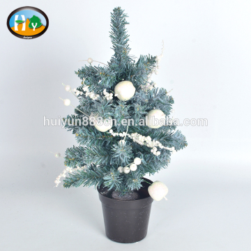 Artificial snowing christmas tree in pot for decorations