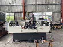 Multi-axis drilling and tapping machine