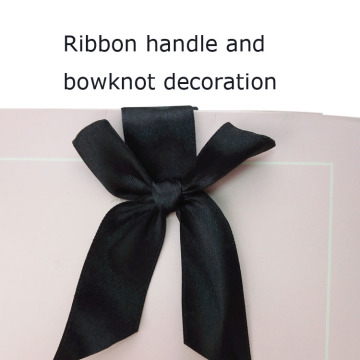 Bowknot Design Logo Foiled Coated Paper Bag