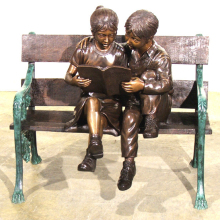 theme park statue metal craft bronze children on bench sculpture