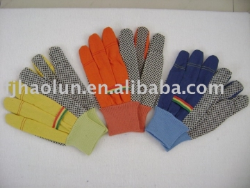 Grey PVC impregnated with black PVC dots glove