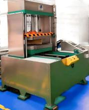 Move-out hot press shaping machine