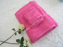 washing new bath towels wooden towels