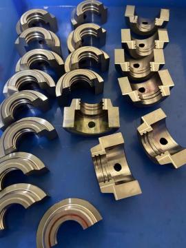 Machining mold components according to drawings