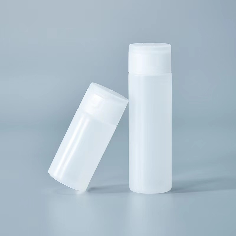 Botella de loción corporal redonda personalizada de plástico con tapa abatible