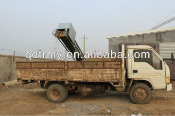 Manure cleaning system for layer raising system