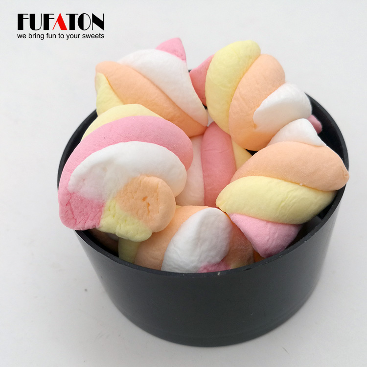 Fruit flavored sweet candy in different packages