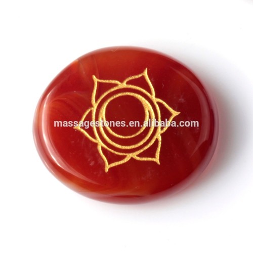 Engraved chakra healing carnelian pocket stone