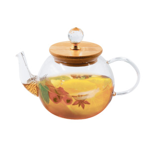 Glass teapot with bamboo cover