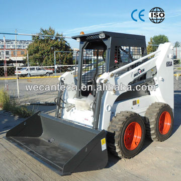 skid steer loader with auger / trencher / broom...