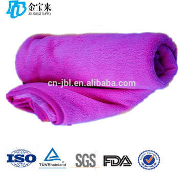 Customized claret-colored soft guest flight blanket