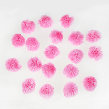 Pink yarn craft pompom ball