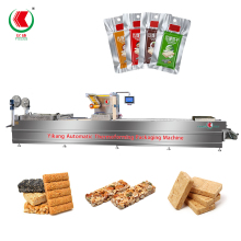 Dual-Side Stretchable Aluminum Foil Thermoforming Vacuum Packaging Machine