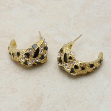 Trendy gold stud earring with diamond