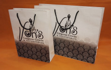 Paper merchandise bags with rope handle