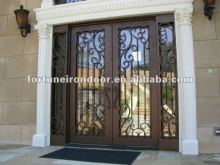 Double wrought iron entrance door with sidelight