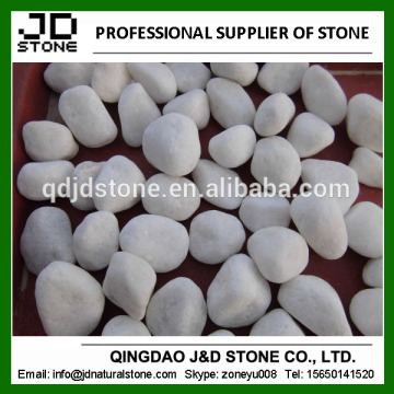 white pebble stone landscaping