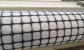 Komposit PP Biaxial Geogrid Dengan Geotextile Nonwoven