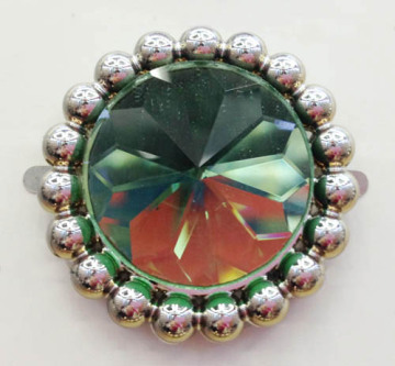 An Enchanting Bridal Accessory with Sparkling Green Stones Trimming