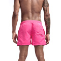 Les shorts classiques roses masculins prennent en charge le logo personnalisé