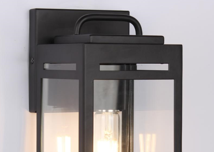 Wall Sconce has classic black with clear glass Wall Sconce has classic black with clear glass