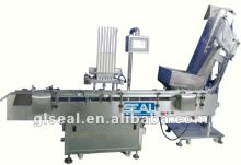 die cutting and cap inserting machine