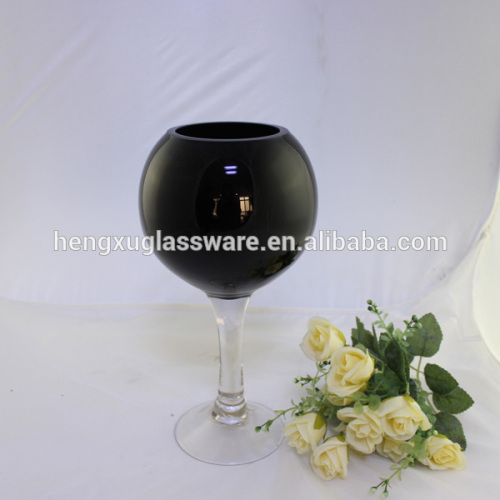 long-stemmed black glass vase