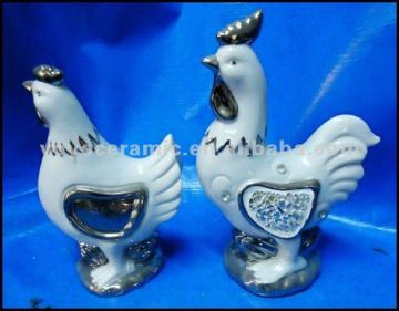 white and sliver ceramic hen decoration