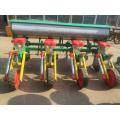 Tractor corn planter with fertilizer