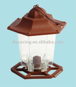 Plastic bird feeder