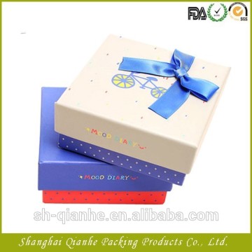 pretty paper shoe box with a bow decoration