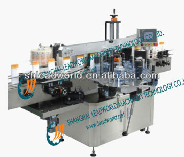 Milk bottle sleeve labeling machine