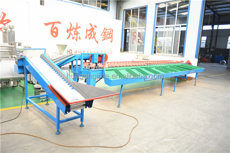 Automatic tomato fruit weight sorter pomegranate sorting machine mandarin and orange grading sorting machine.
