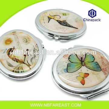 Cheap different style new round metal hand mirror