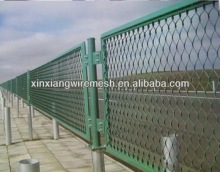 Expanded wire mesh fence